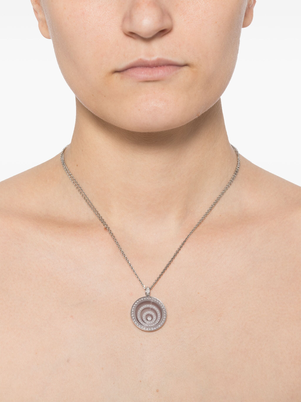White diamond Happy Spirit necklace by Chopard, featuring a delicate fine jewelry pendant with sparkling diamonds.
