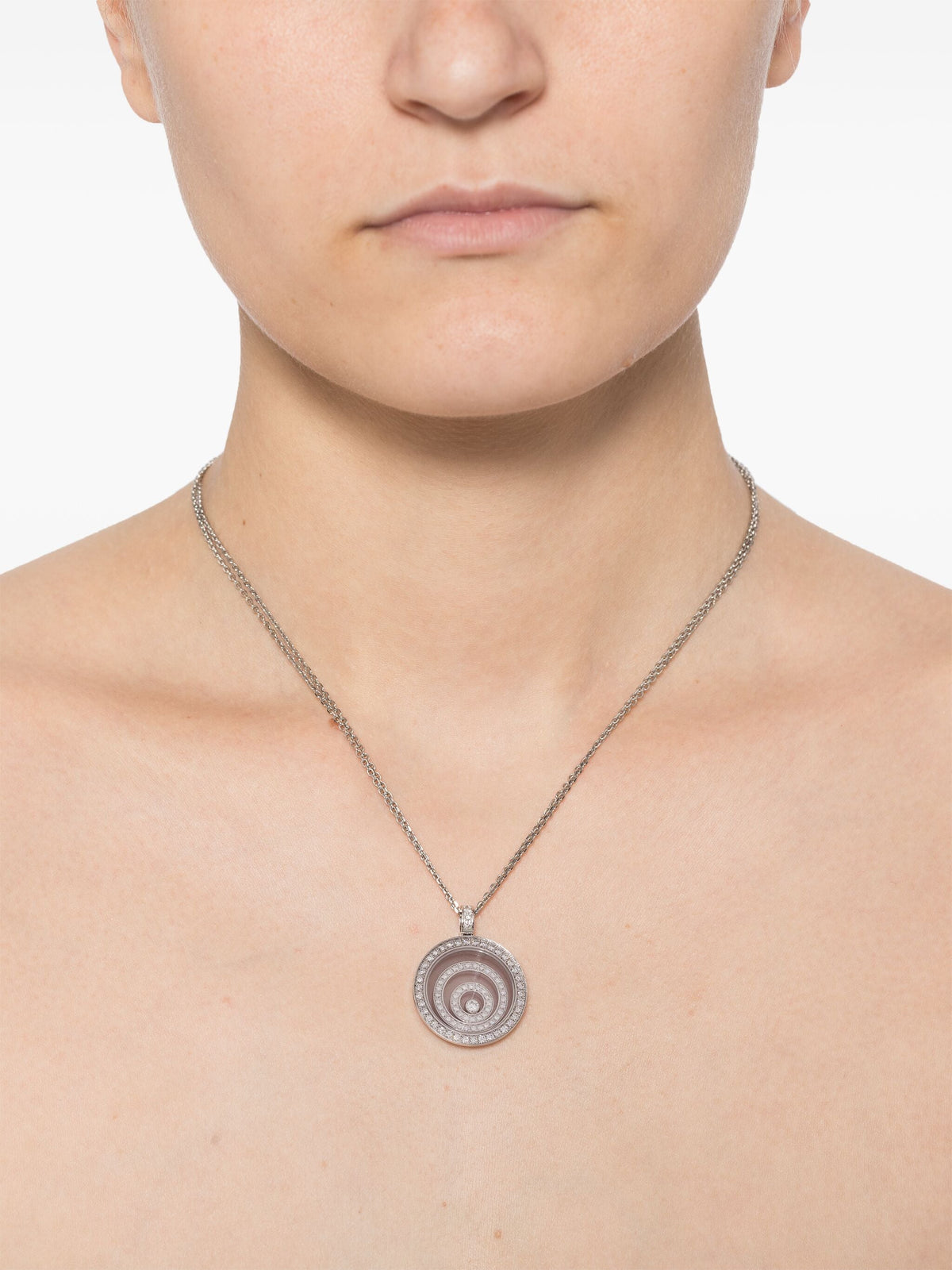 White diamond Happy Spirit necklace by Chopard, featuring a delicate fine jewelry pendant with sparkling diamonds.