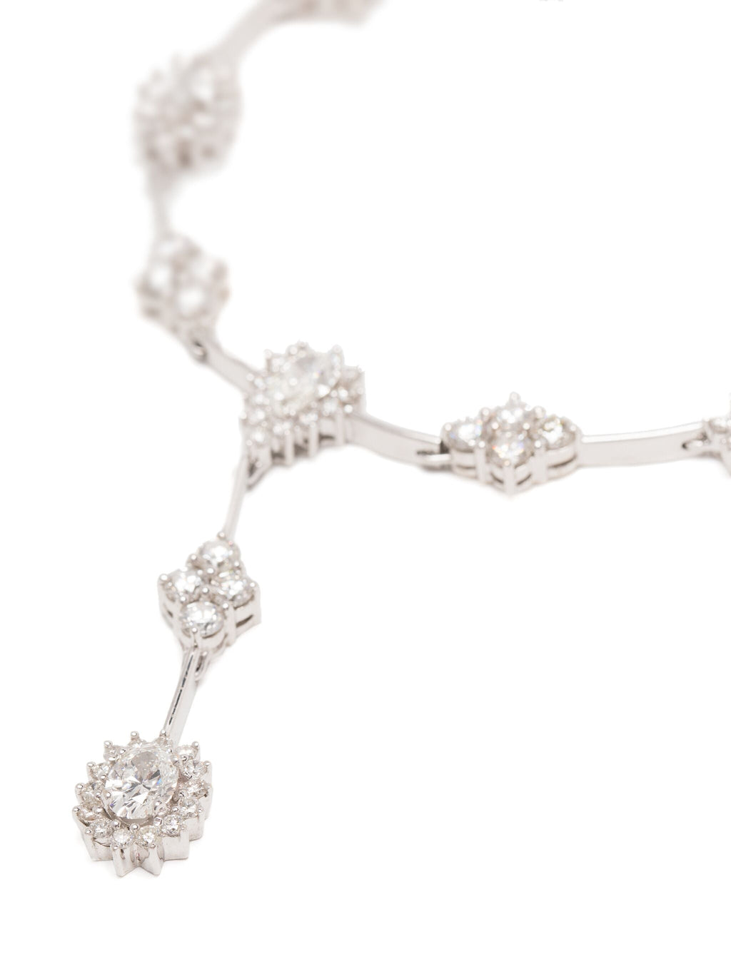 White gold diamond flower pendant from Vintage Finds, showcasing a delicate floral design with sparkling diamonds in fine jewelry style.