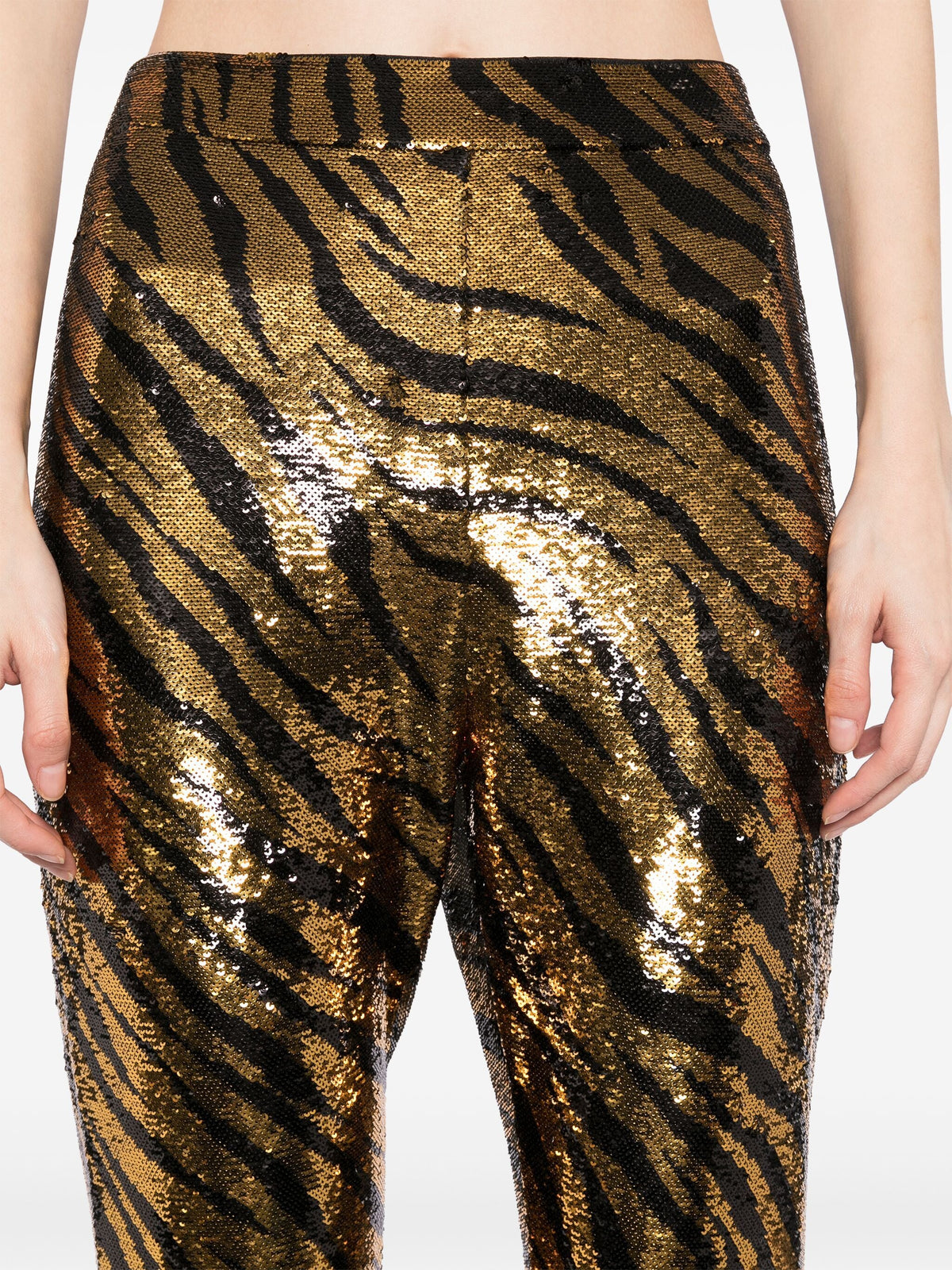 Balenciaga sequin stretch-jersey leggings, stylish trousers with shimmering sequin details and a fitted, stretchy design.