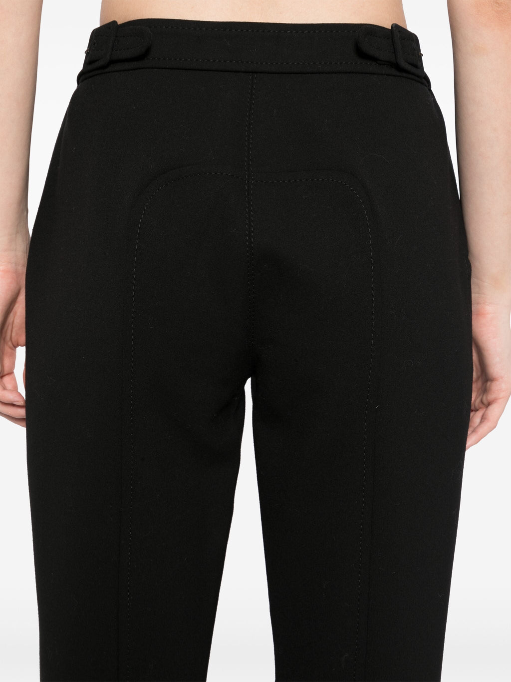 Hermès black riding trousers featuring tailored fit and classic design, suitable for equestrian activities and casual wear.