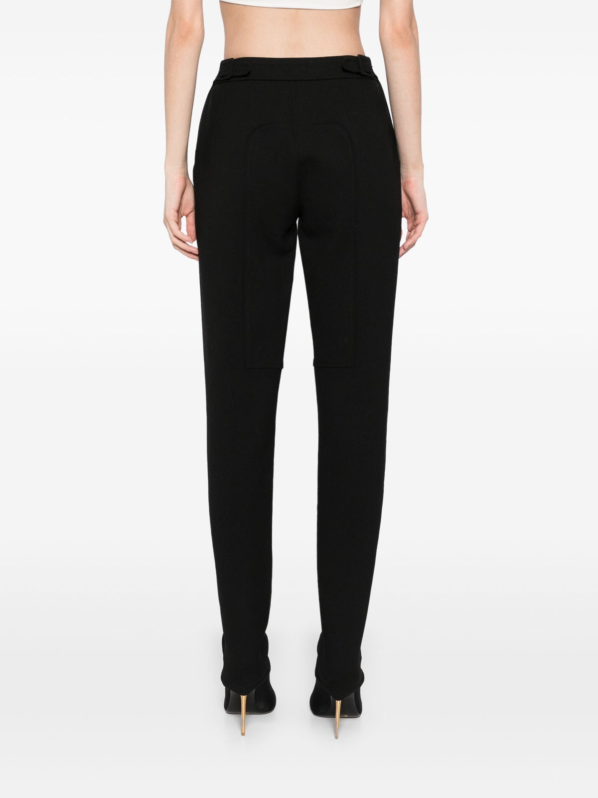 Hermès black riding trousers with tailored fit and sleek design, suitable for equestrian activities and casual wear.