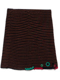 Navy Prada crochet embellished spring 2005 skirt with intricate detailing, styled with a flowing design and textured fabric.