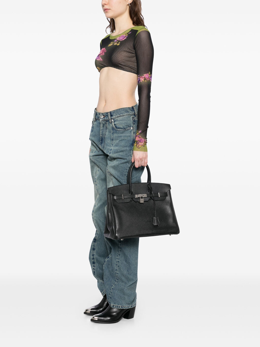 Hermès Birkin 35 black Epsom leather top handle bag with gold hardware, showcasing its elegant design and textured finish.