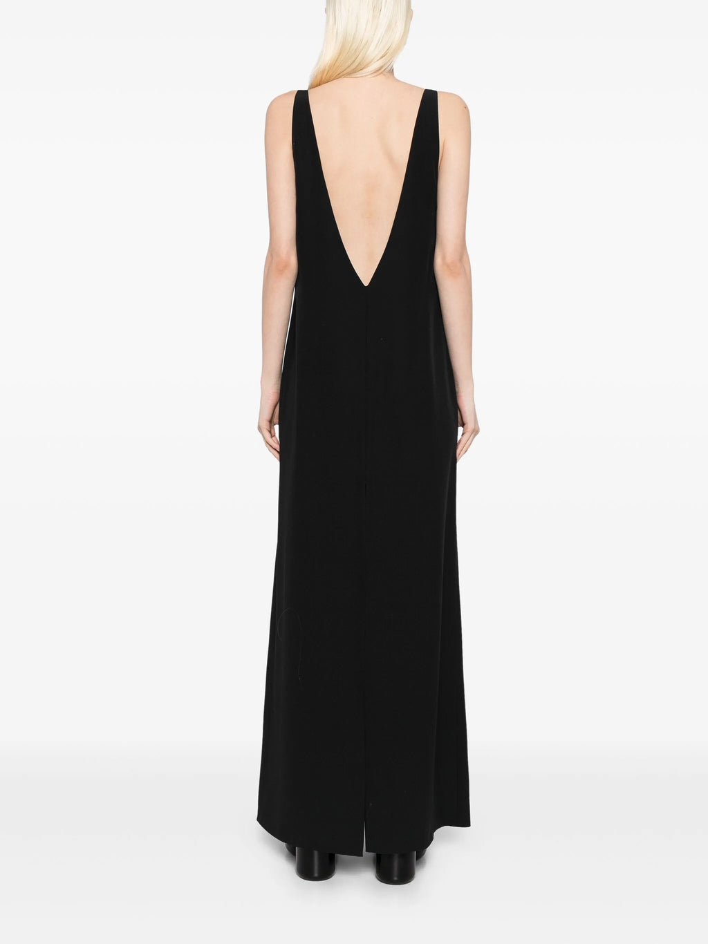 Deep V-neck slip dress by The Row, elegant sleeveless dress with smooth fabric and minimalist design, ideal for sophisticated style.