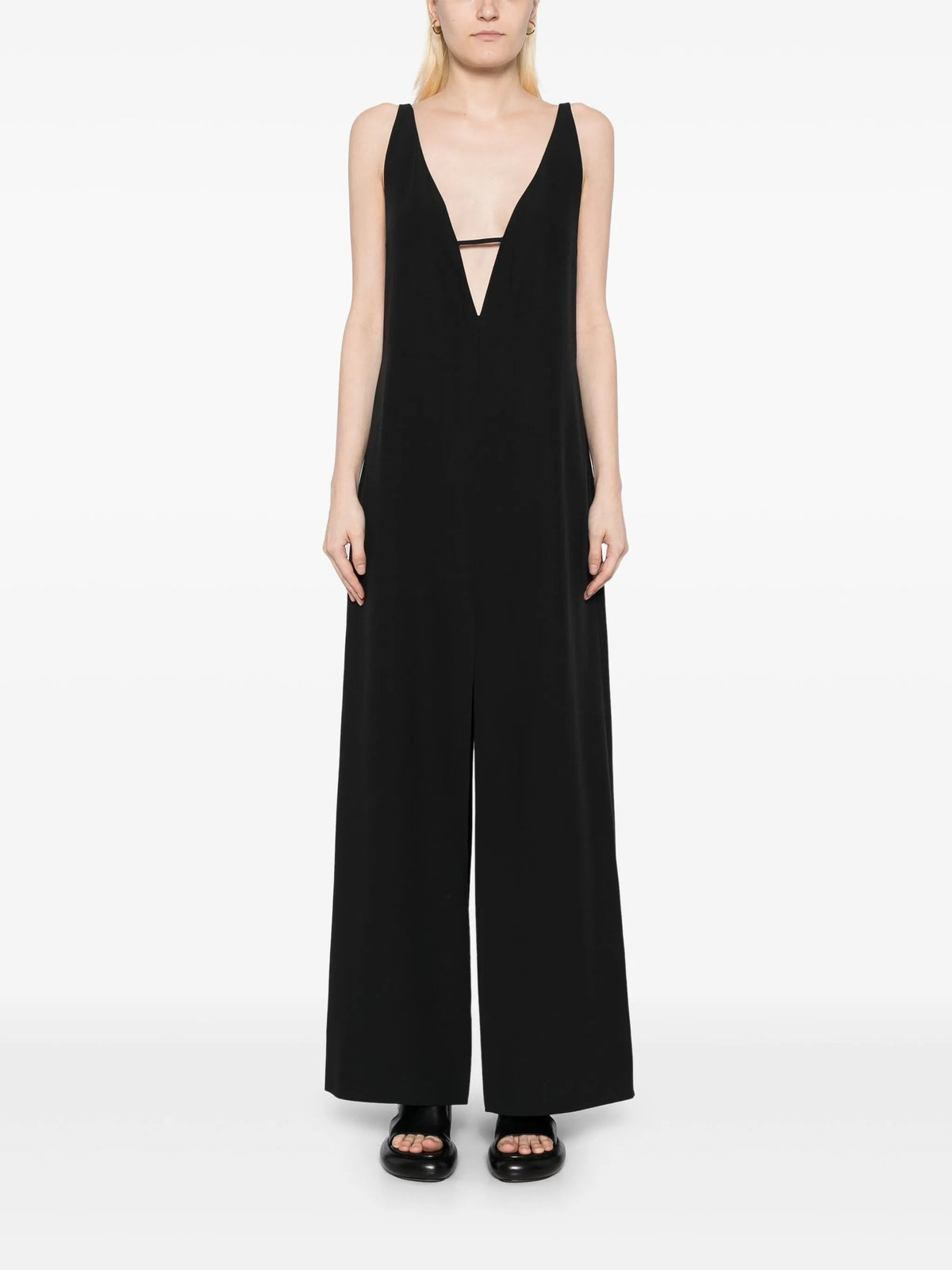 Deep V-neck slip dress by The Row, elegant sleeveless dress with smooth fabric and a flattering deep V neckline.