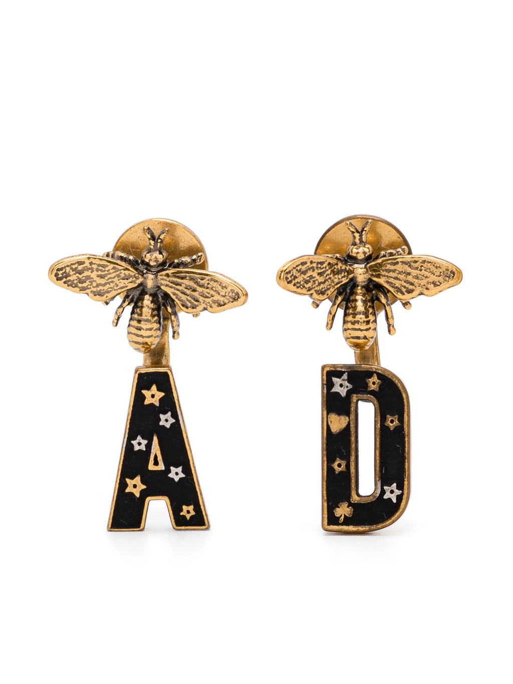 Dior "A" and "D" Bee earrings featuring gold-tone metals and intricate bee motifs on a white background.