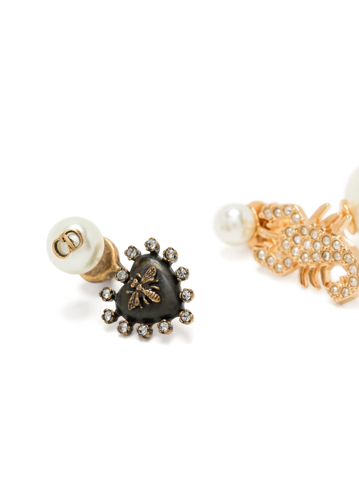 Dior Bee and Scorpion Tribal Earrings featuring intricate gold-tone bee and scorpion designs on each earring.