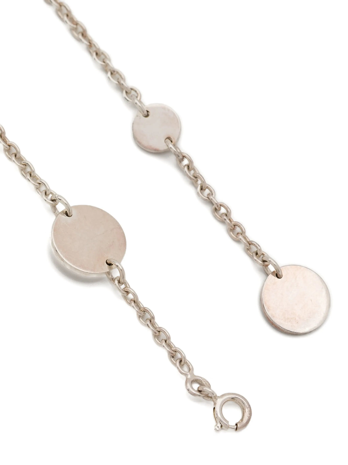 Hermès Ex Libris long necklace with elegant chain and pendant, showcasing sophisticated jewelry design.