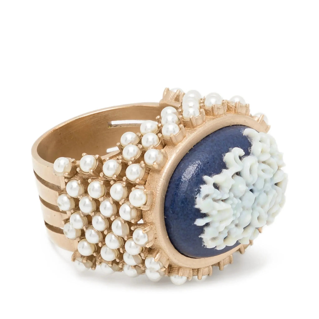 Dior ornate ring with pearls featuring intricate design and silver band, showcasing luxury jewelry elegance.