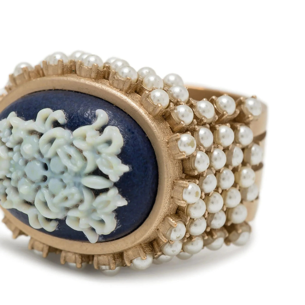 Dior ornate ring with pearls featuring intricate gold detailing and elegant design, perfect for sophisticated jewelry collection.