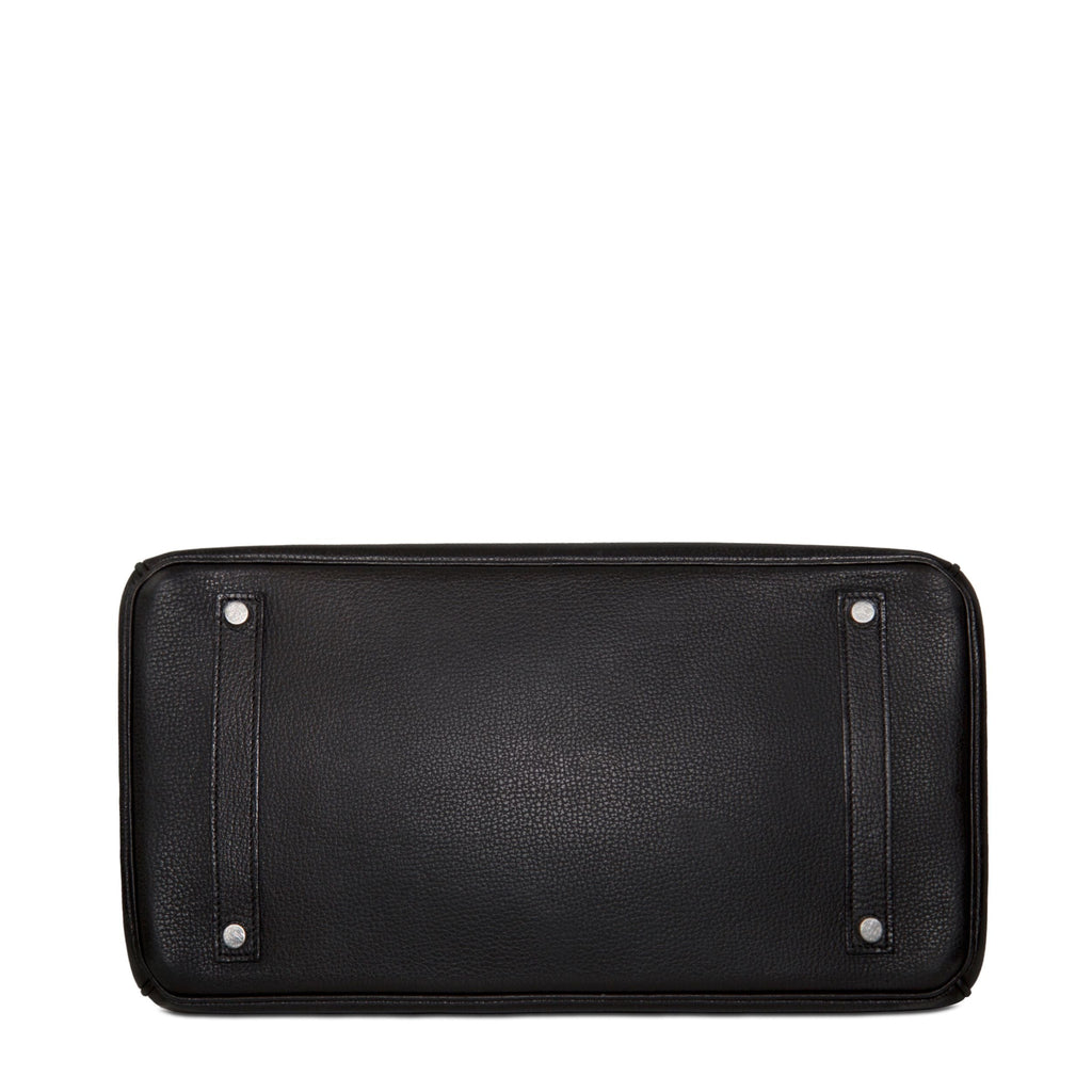 Hermès Birkin 35 Black Togo leather top handle bag with gold hardware, showcasing its luxurious design and structured silhouette.