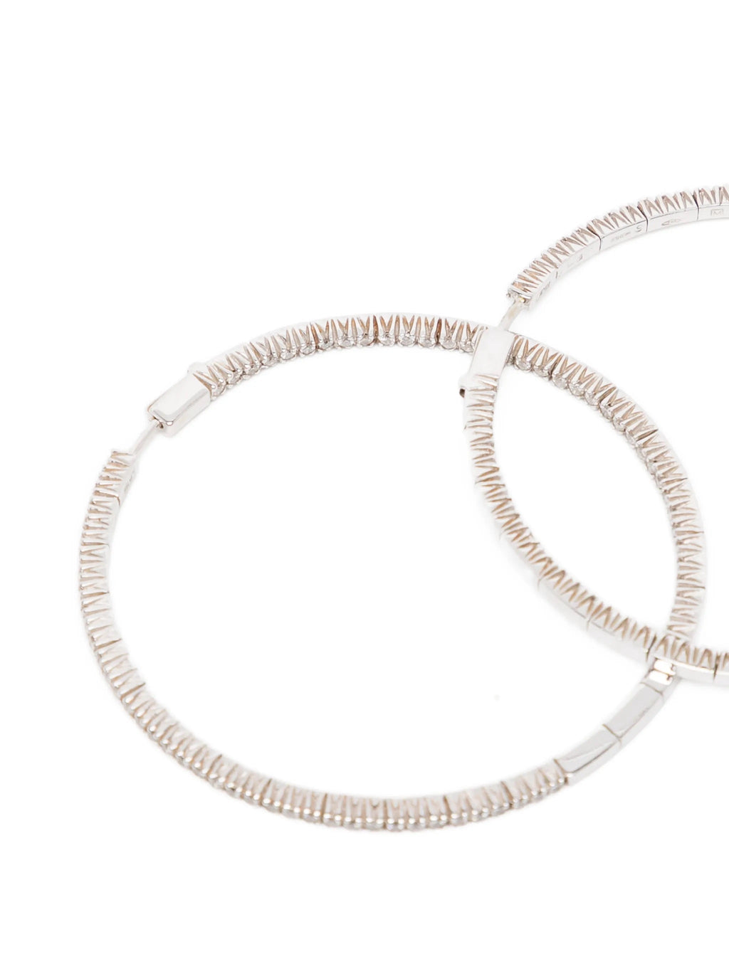 Vintage Finds pavé hoop earrings with sparkling gemstone accents, showcasing a stylish and elegant jewelry design.
