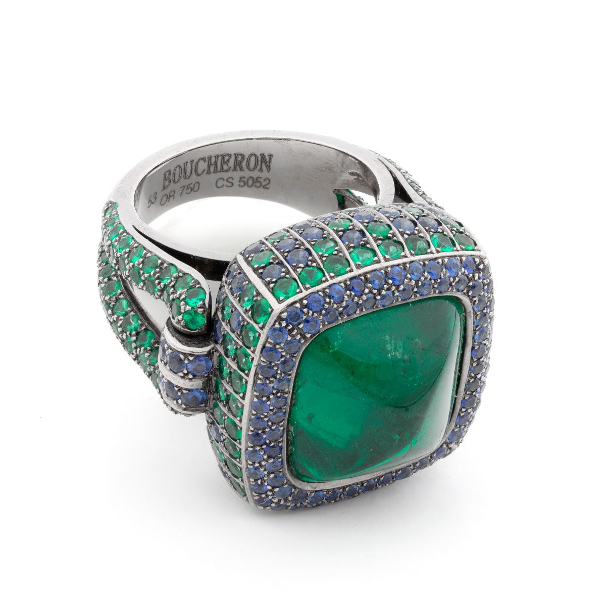 15kt emerald and sapphire ring by Boucheron featuring a vibrant emerald and deep blue sapphires set in a luxurious ring design