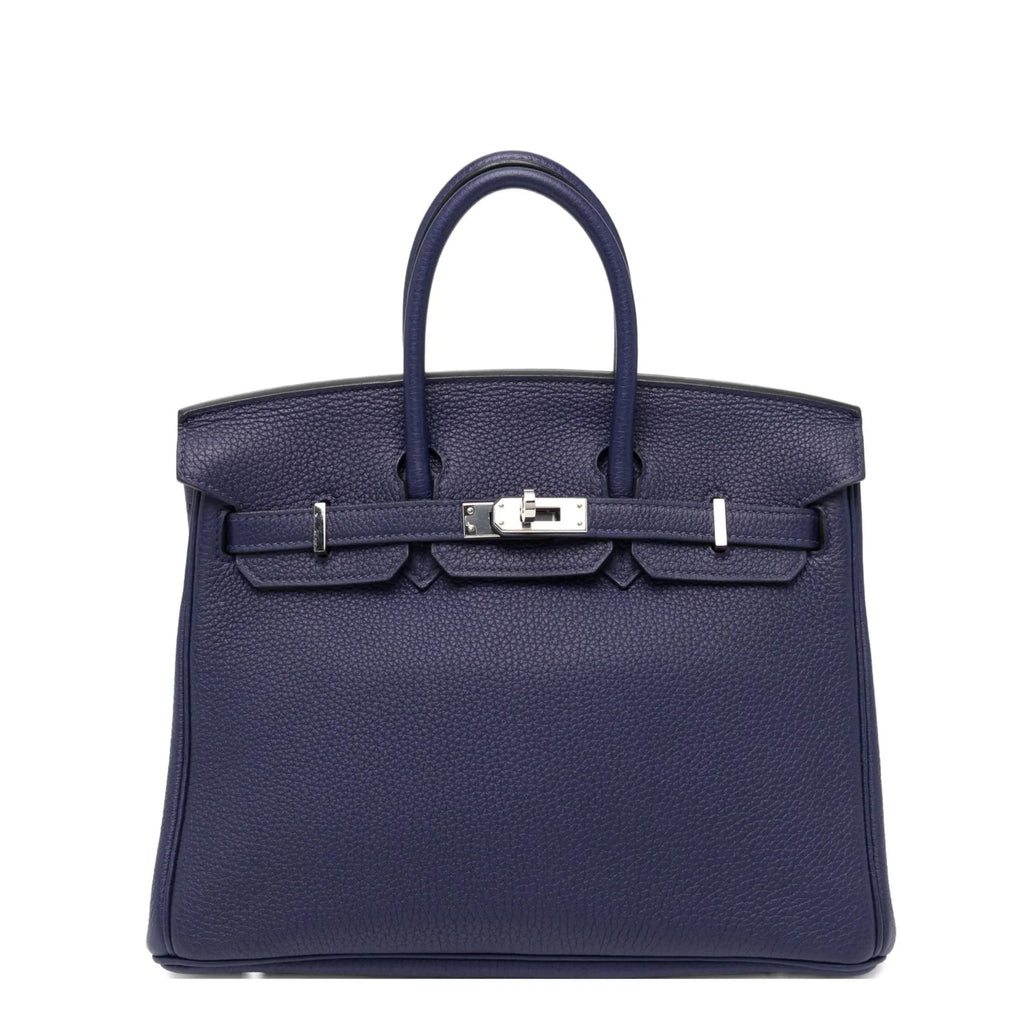 Hermès Birkin 25 Retourne Blue Sapphire Togo leather top handle bag with PHW hardware, showcasing elegant craftsmanship and design.