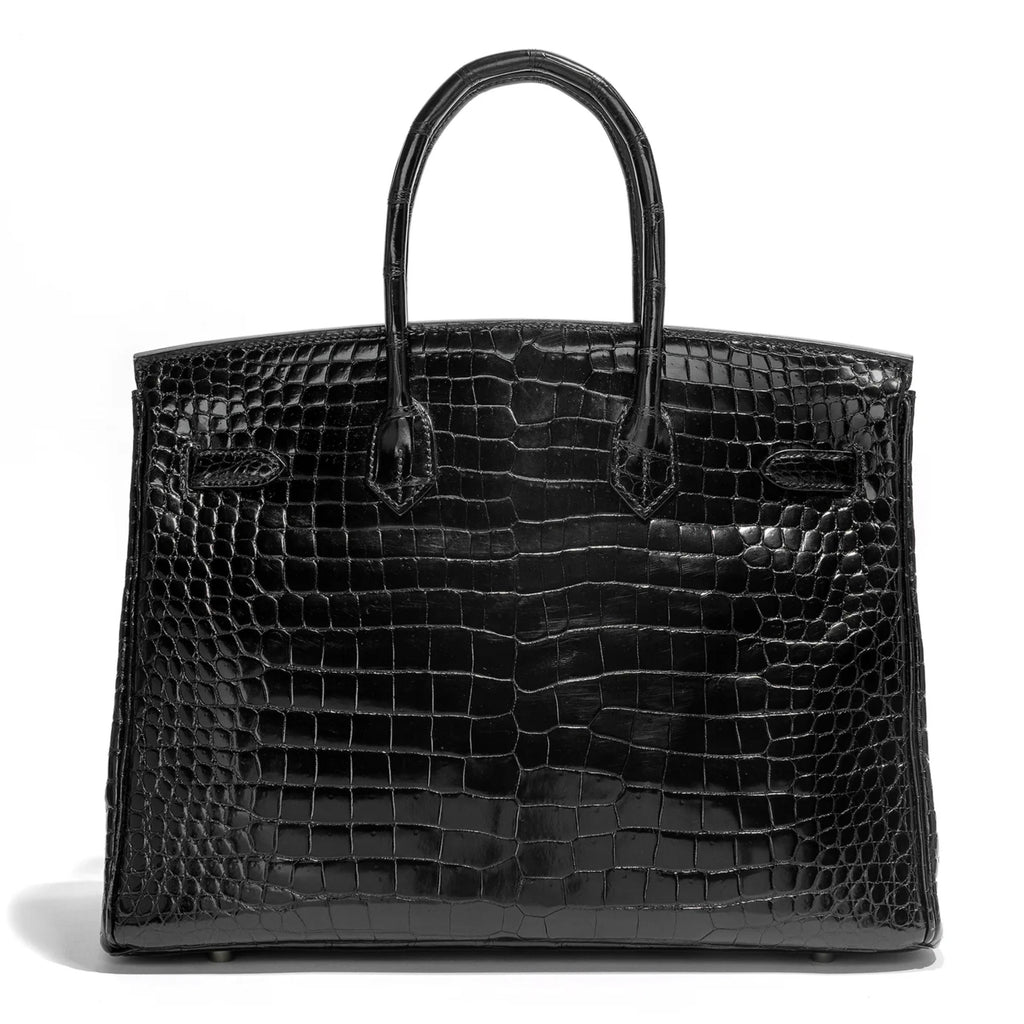 Hermès Birkin 35 Black GHW top handle bag with gold hardware, showcasing sleek leather craftsmanship and elegant design.