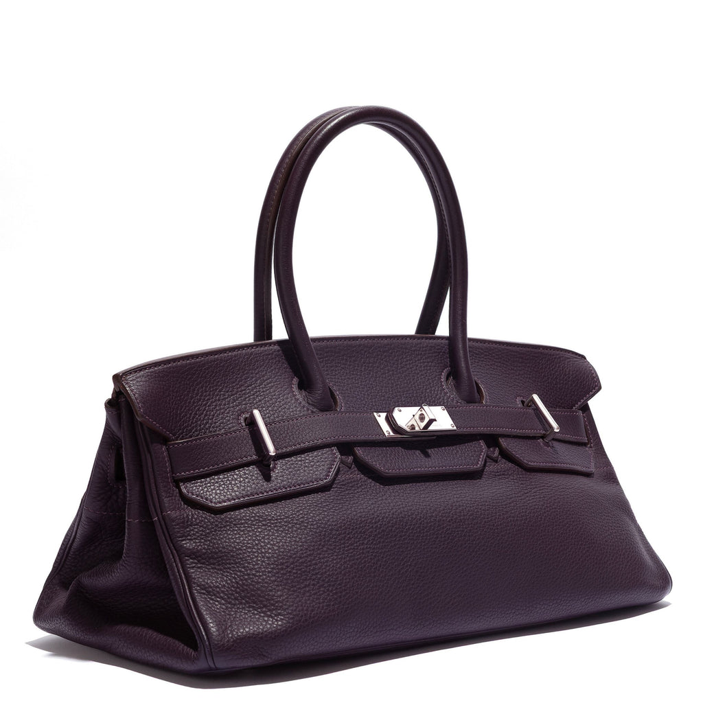 Hermès JPG Shoulder Birkin 42 Raisin Togo leather bag with gold hardware, featuring structured design and top handles.