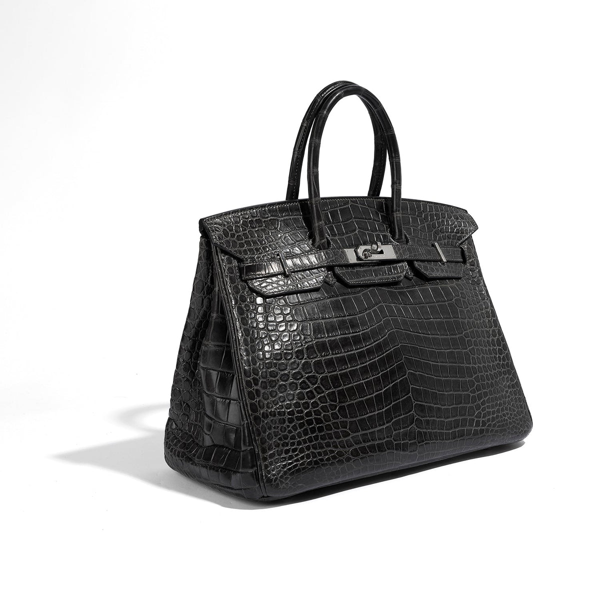 Hermès Birkin 35 grey PHW top handle bag displayed on a plain background, showcasing its elegant design and top handle details.