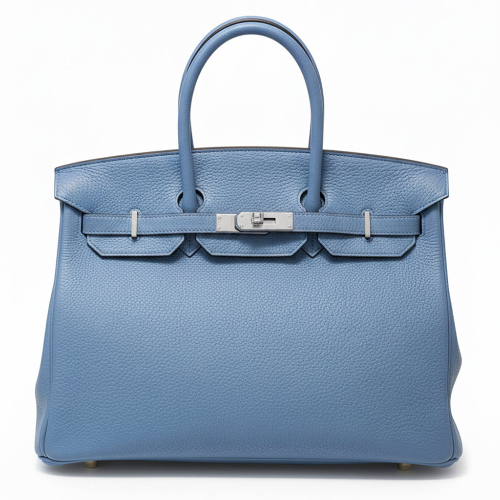 Hermès Birkin 35 Blue PHW top handle bag showing front view with structured leather and gold hardware.