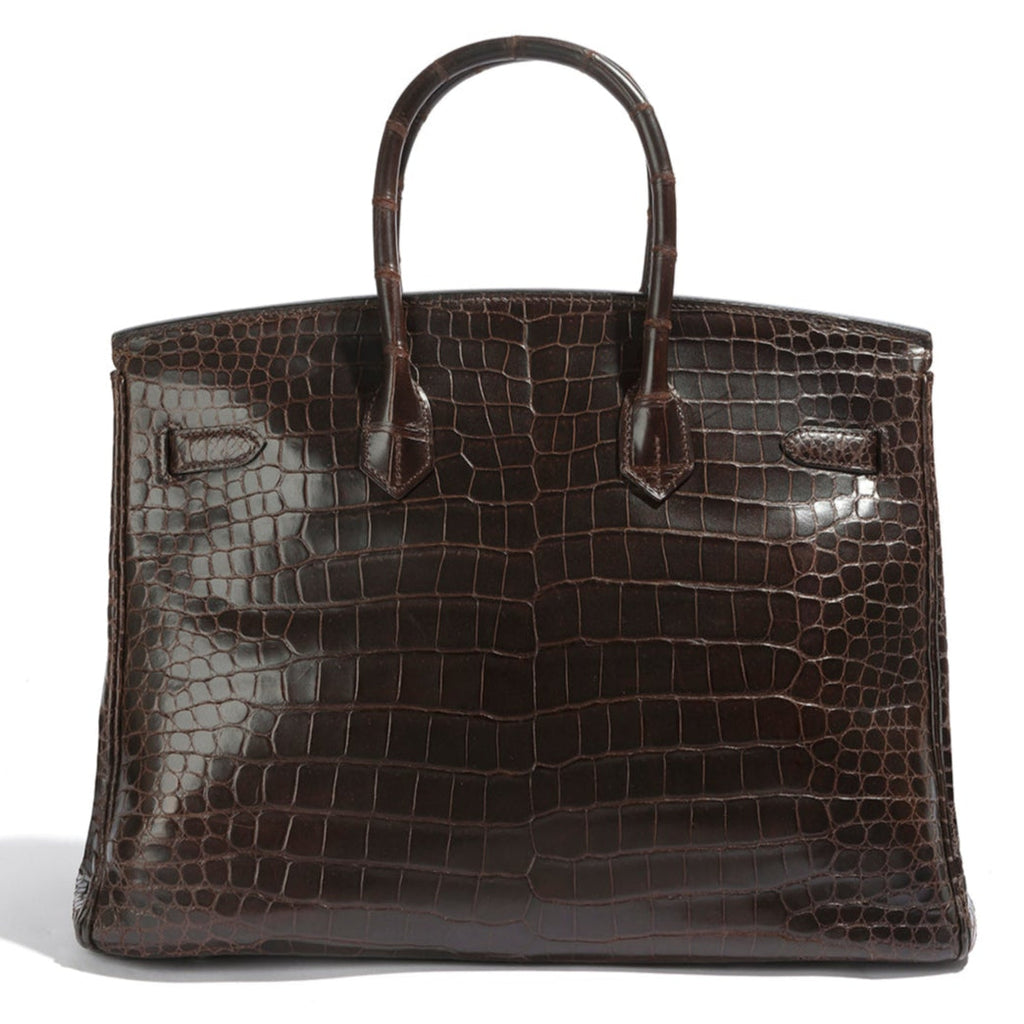Hermès Birkin 35 Marron PHW top handle bag in brown leather, featuring gold hardware and structured design.