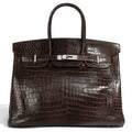 Hermès Birkin 35 Marron PHW top handle bag in brown leather, showcasing its elegant design and gold hardware.
