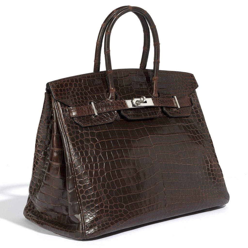 Hermès Birkin 35 Marron PHW top handle bag with smooth leather and gold hardware, showcasing its elegant design.