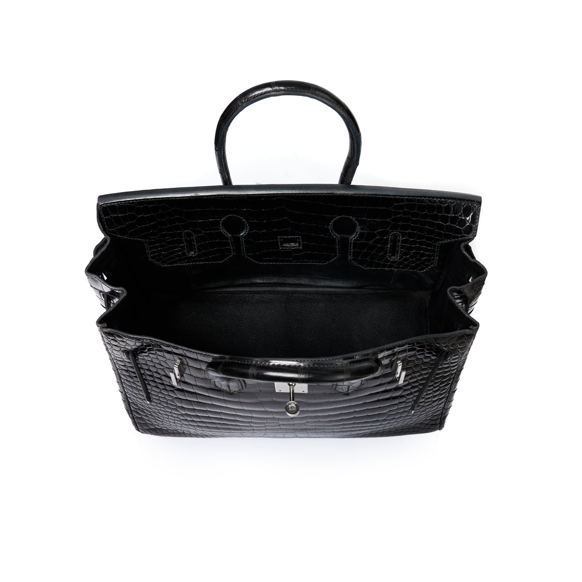 Hermès Birkin 35 Exotic top handle bag with PHW hardware, showcasing luxurious textured leather and elegant design.