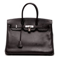 Hermès Birkin 35 Black Epsom leather top handle bag with gold hardware, showcasing its elegant design and structured shape.