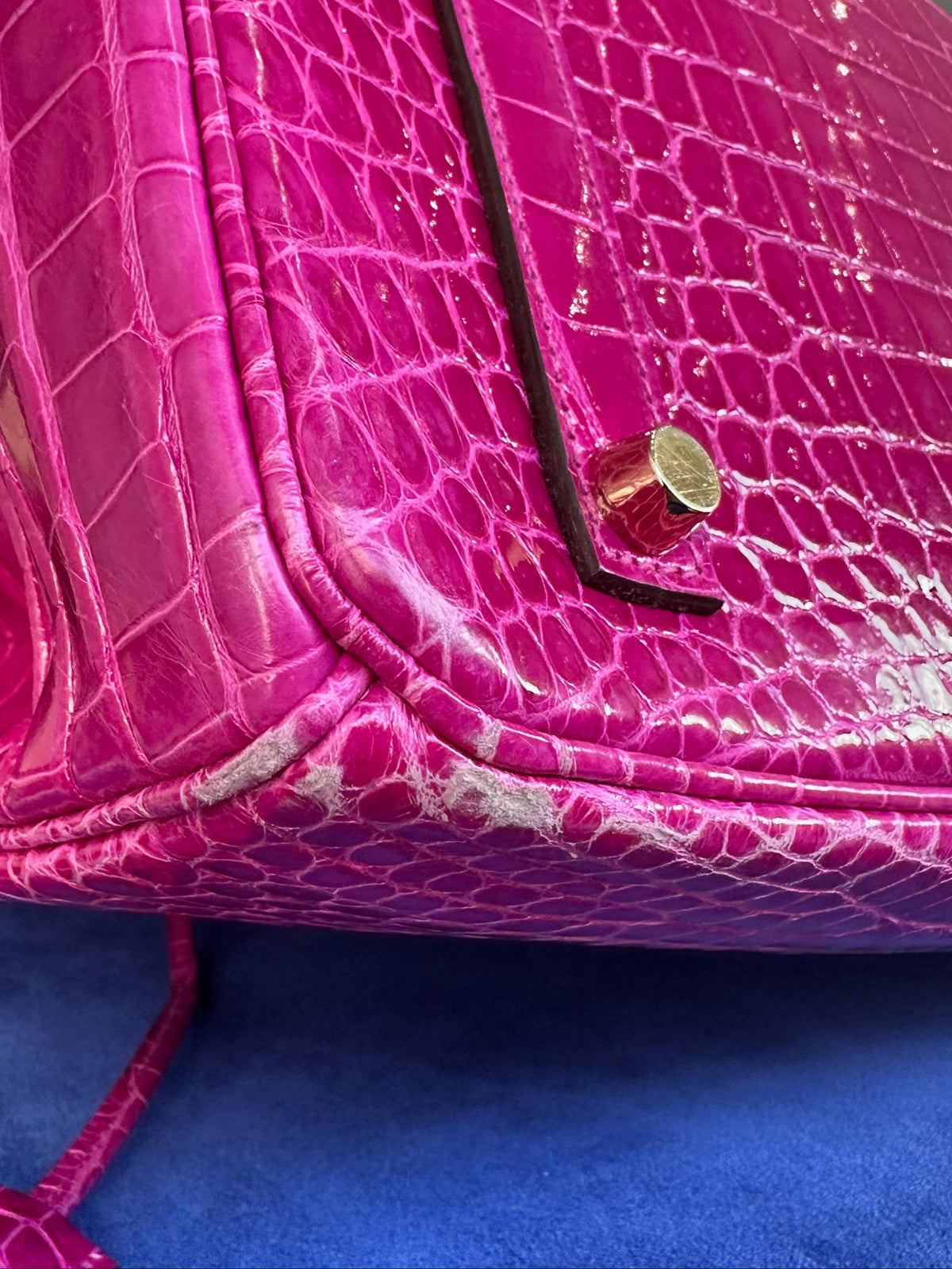 Hermès Birkin 35 Rose Sheherazade GHW top handle bag displayed from a corner angle with gold hardware.