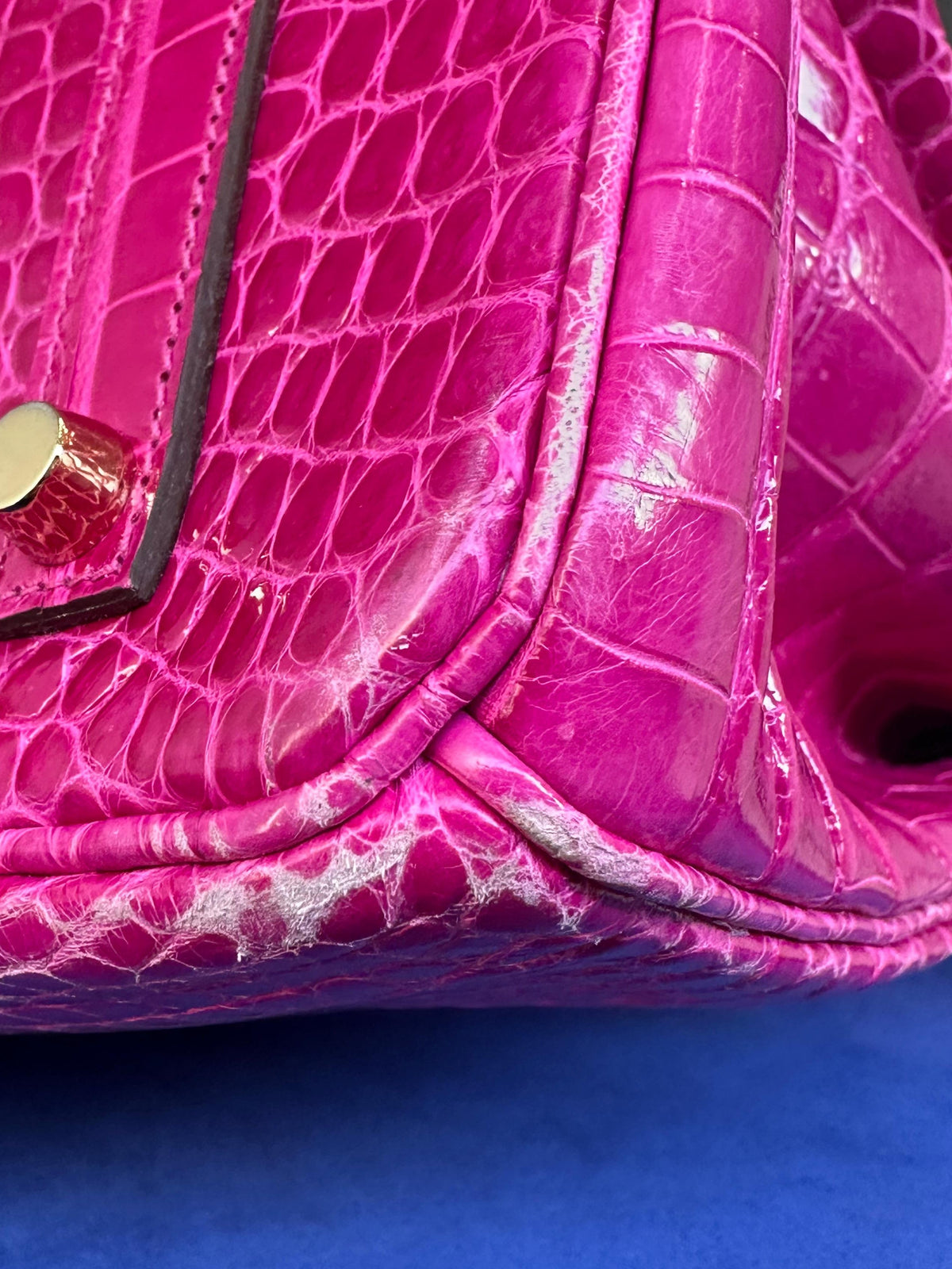 Hermès Birkin 35 Rose Sheherazade GHW top handle bag shown from a corner view featuring gold hardware and luxurious leather.