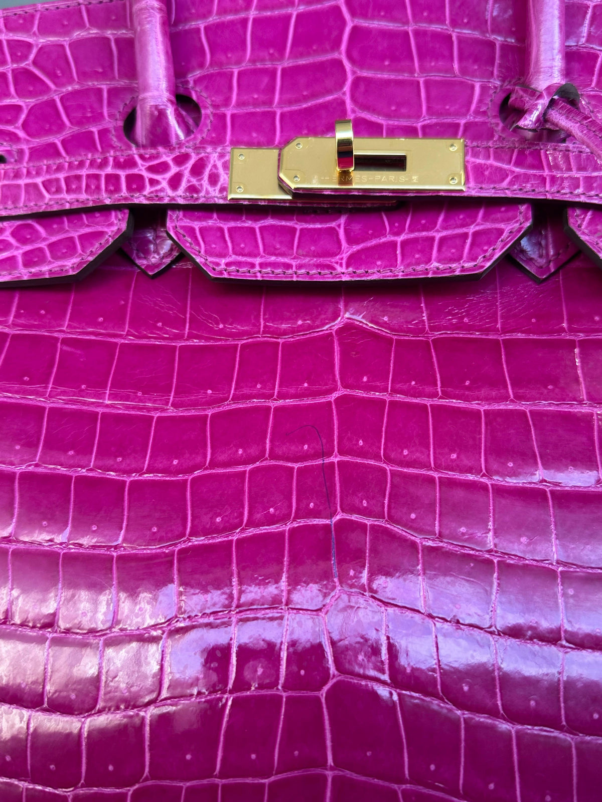 Hermès Birkin 35 Rose Sheherazade GHW top handle bag with gold hardware, showcasing soft pink leather and elegant design.