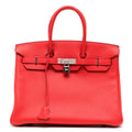 Hermès Birkin 35 Rouge Casaque Clemence leather top handle bag with gold hardware, showcasing its luxurious design and vibrant color.