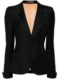 Bottega Veneta black single-breasted blazer with satin-trimmed notched lapels, single-button fastening, long sleeves and front flap pockets.