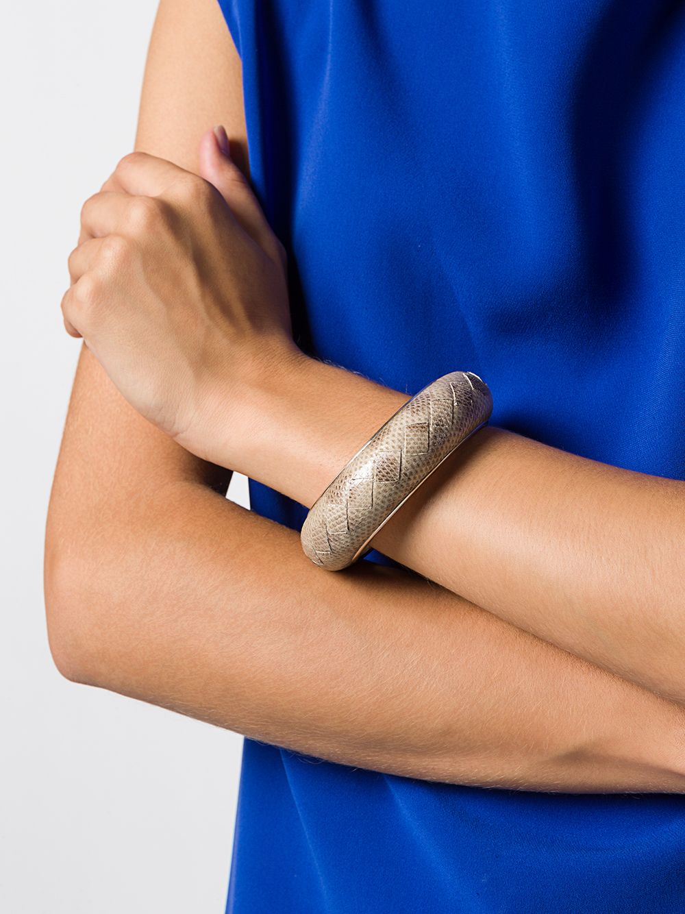 Bottega Veneta cuff bracelet featuring sleek, modern design with smooth leather and signature intrecciato weave details.