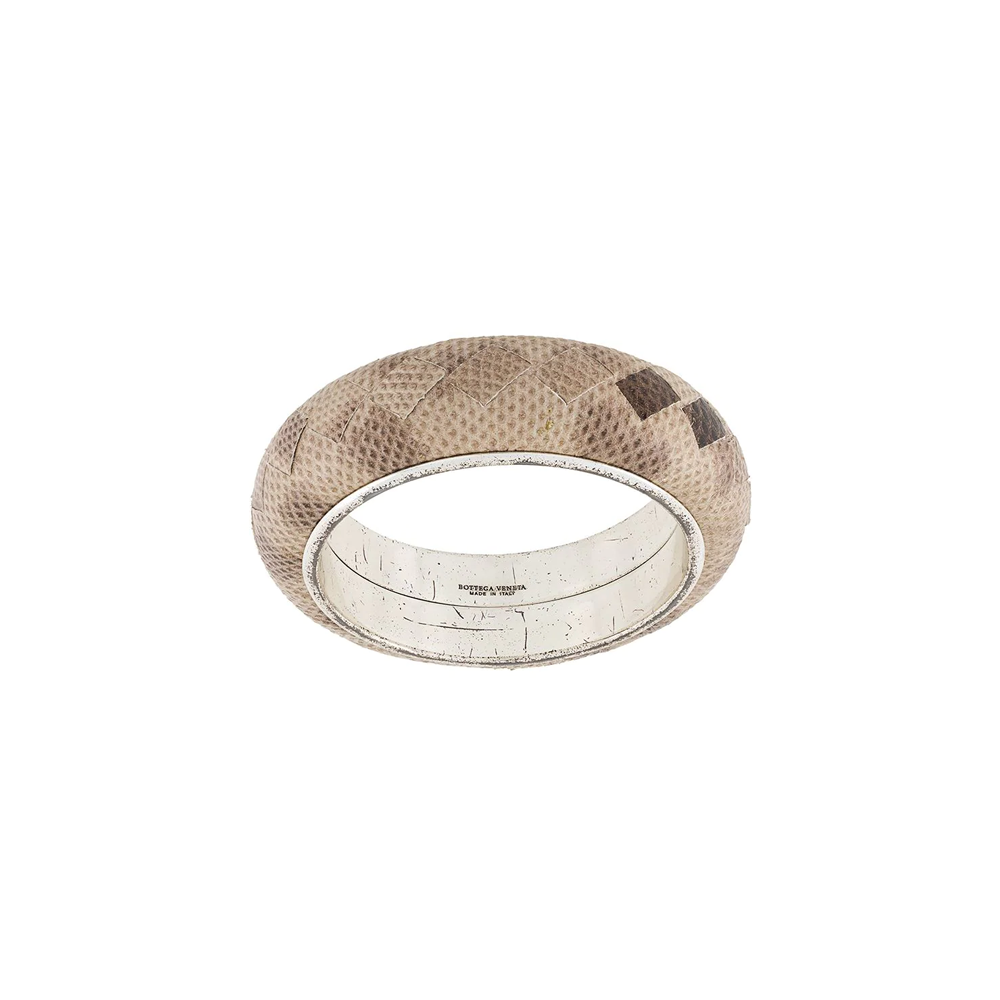 Bottega Veneta cuff bracelet featuring sleek, minimalist design with smooth leather and signature intrecciato weave detail.