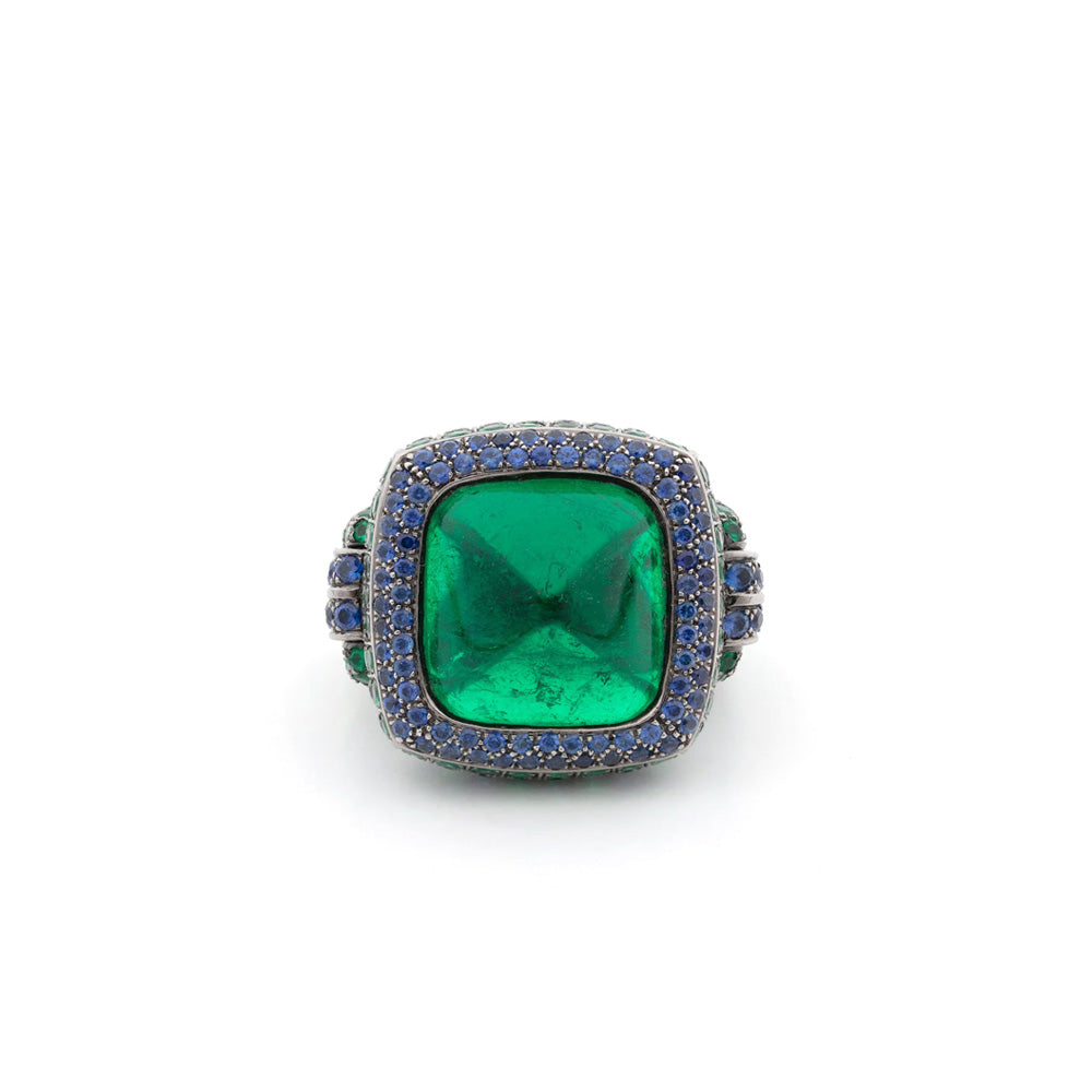 Elegant 15kt gold emerald and sapphire ring by Boucheron showcasing vibrant gemstones and intricate band design.