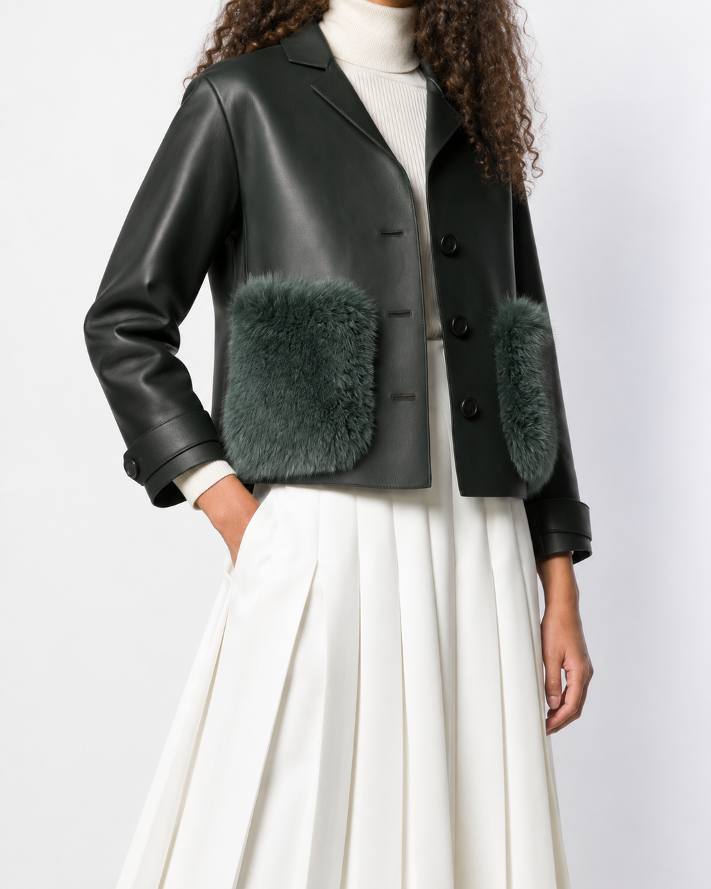 Black leather coat with fur trim by Prorsum, featuring a sleek design and stylish details, perfect for cold weather.