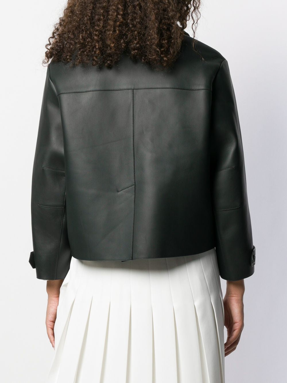 Black leather coat with fur trim from Prorsum, featuring a sleek design and stylish details, perfect for a sophisticated look.