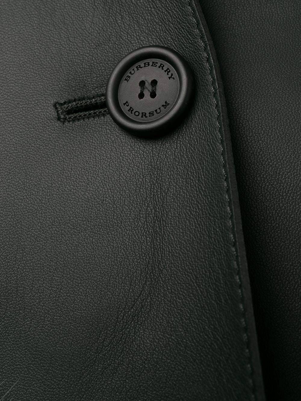 Black leather coat with fur trim from Prorsum, stylish designer jacket featuring a sleek design and premium craftsmanship.