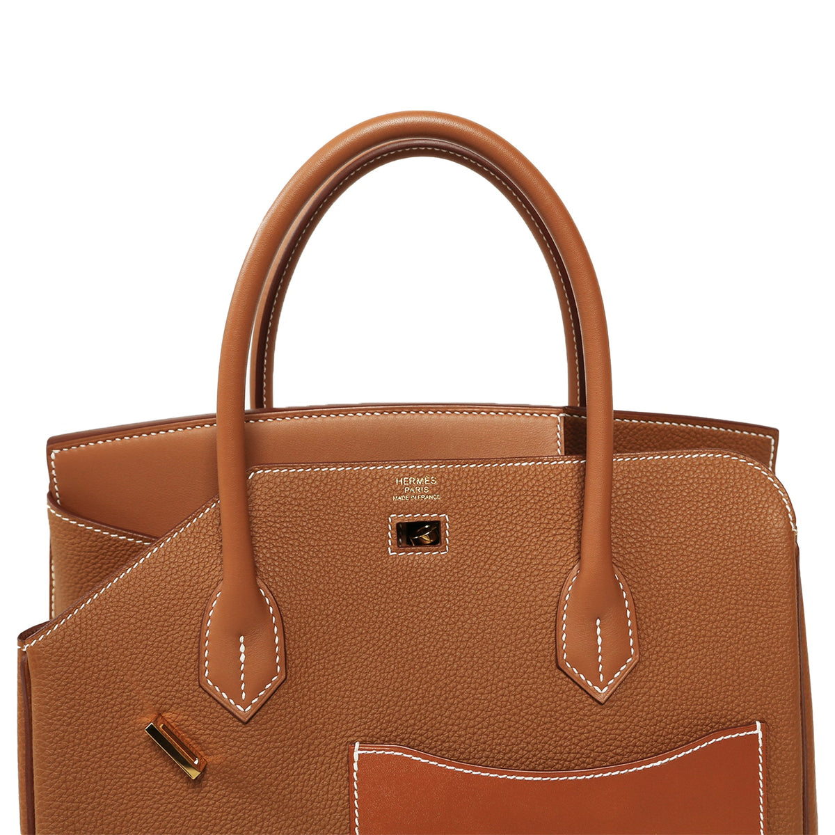 Hermès Birkin 30 Top Handle Bag in Desordre Gold with gold hardware, close-up of luxurious leather and detailed craftsmanship.