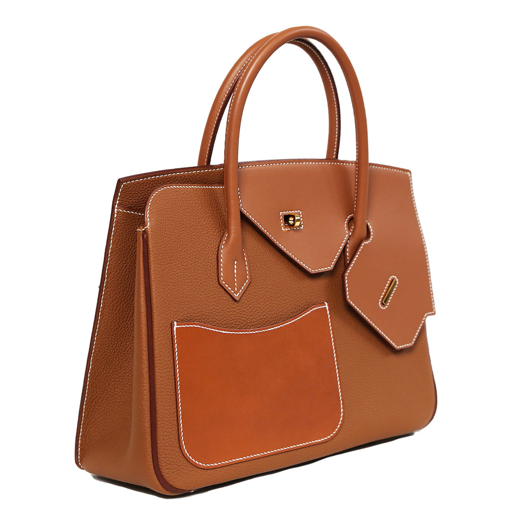 Hermès Birkin 30 Desordre Gold GHW top handle bag shown from the side with gold hardware and structured leather design.