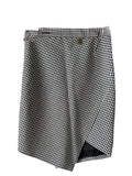 Balenciaga houndstooth asymmetrical skirt featuring a stylish front view with bold pattern and modern design.