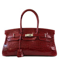 Hermès JPG Shoulder Birkin 42 Red Porosus PHW leather shoulder bag with top handle and gold hardware.