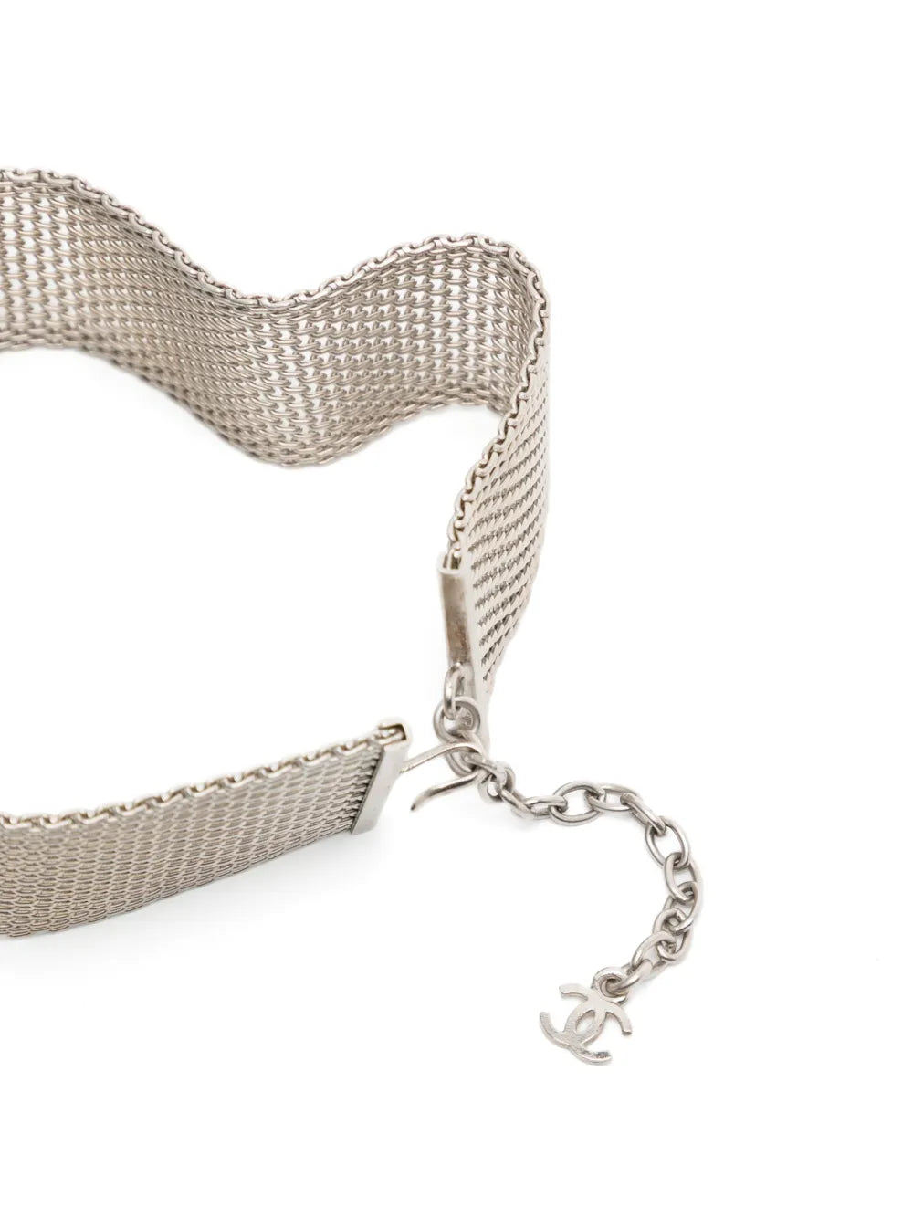 Close-up of Chanel Camellia Choker Necklace featuring elegant floral design and delicate chain, showcasing luxury jewelry craftsmanship.