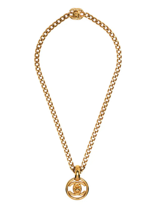 Chanel 1997 CC Turnlock pendant chain necklace featuring a classic silver-tone CC logo and sleek chain design.