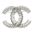 Chanel crystal pin brooch with sparkling gemstone accents and elegant design, shown from the front view.