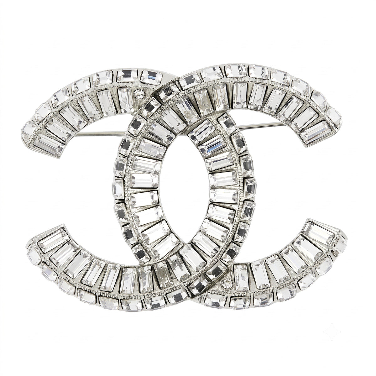 Chanel crystal pin brooch with sparkling gemstone accents and elegant design, shown from the front view.