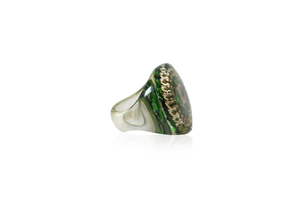 Chanel green tweed ring featuring a textured fabric-inspired design, elegant jewelry piece for stylish accessories.