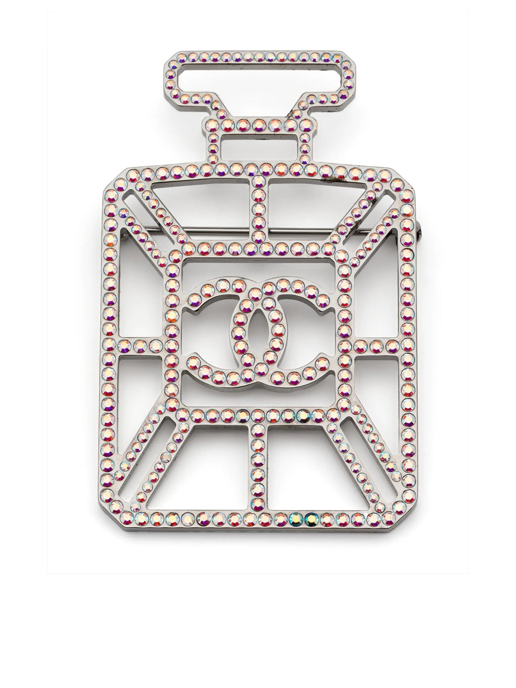 Iridescent Chanel perfume bottle brooch with CC logo, decorative jewelry accessory, shiny glass-like finish, detailed design.