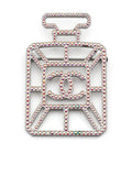 Iridescent Chanel perfume bottle brooch with CC logo, decorative jewelry accessory, shiny glass-like finish, detailed design.